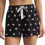Load image into Gallery viewer, Black shorts with white ghost pattern and drawstring on a white background