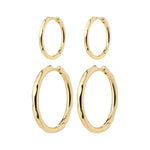 Load image into Gallery viewer, Set of gold hoop earrings on a white background. Huggie closure.