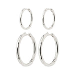 Load image into Gallery viewer, Set of silver hoop earrings on a white background. Huggie closure.