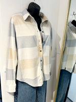 Load image into Gallery viewer, Plaid button shirt in a cream, blue, and beige pattern.