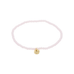 Load image into Gallery viewer, Pink beaded bracelet with a gold charm on a white background