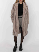 Load image into Gallery viewer, Person wearing a long fur coat on a white background