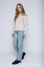 Load image into Gallery viewer, Woman wearing a stone long-sleeve crewneck tee