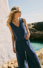 Load image into Gallery viewer, Indigo knit denim button up sleeveless blouse with v neckline.