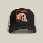 Load image into Gallery viewer, Black and beige denim trucker hat with skull patch and 'CANCELLED' text on a white background
