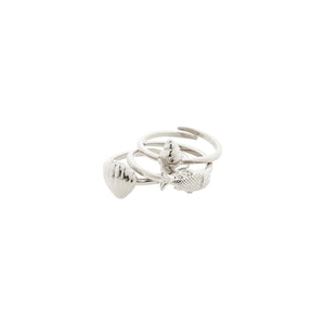 Set of three silver rings with fish designs on a white background