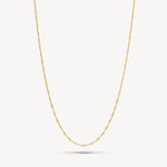 Load image into Gallery viewer, Gold chain necklace on a light gray background
