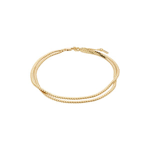 Ankle bracelet featuring two flat snake chains, also known as Herringbone chains, in gold. 