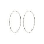 Load image into Gallery viewer, Pair of silver hoop earrings on a white background
