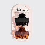 Load image into Gallery viewer, Two hair claw clips in packaging with 'kit-sch' branding on a light gray background
