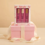 Load image into Gallery viewer, Kit-sch hair perfume trio set with pink packaging on a beige background
