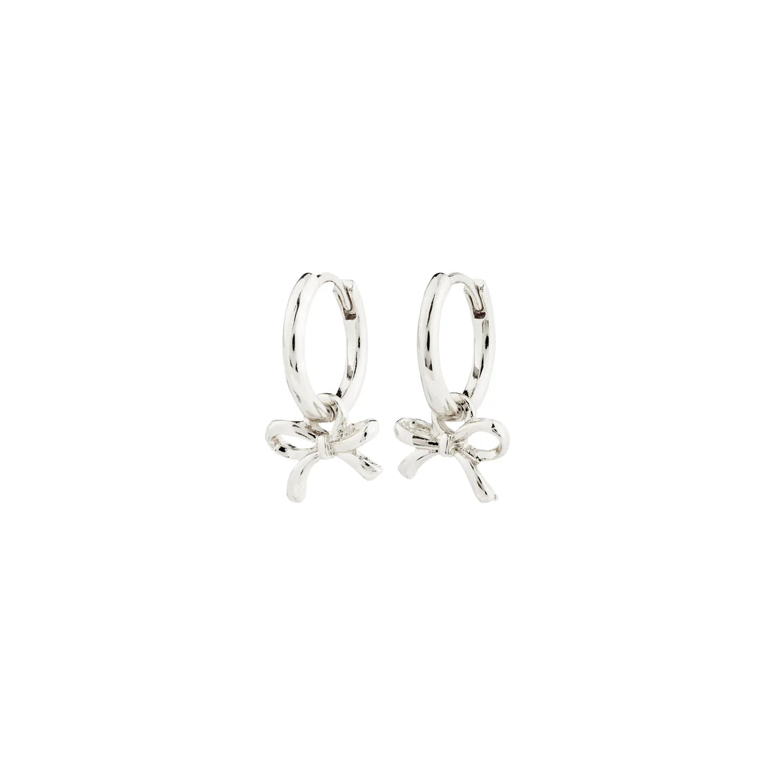 Silver hoop earrings with bow details on a white background