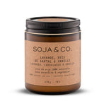 Load image into Gallery viewer, Candle in a brown jar with a kraft paper label featuring 'SOJA &amp; CO.' on a white background.
