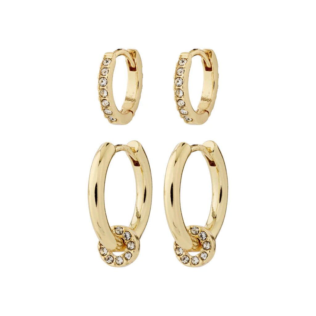 Gold  set of huggie earrings with crystals.  