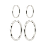 Load image into Gallery viewer, Set of silver hoop earrings on a white background. Huggie closure. 

