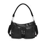Load image into Gallery viewer, Black vegan leather purse with front zippered pockets. 
