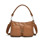 Load image into Gallery viewer, Brown vegan leather handbag with a shoulder strap and zippered front pockets on a white background

