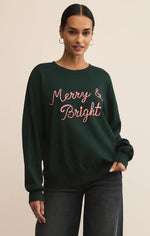 Load image into Gallery viewer, Crewneck sweatshirt with merry and bright graphic 
