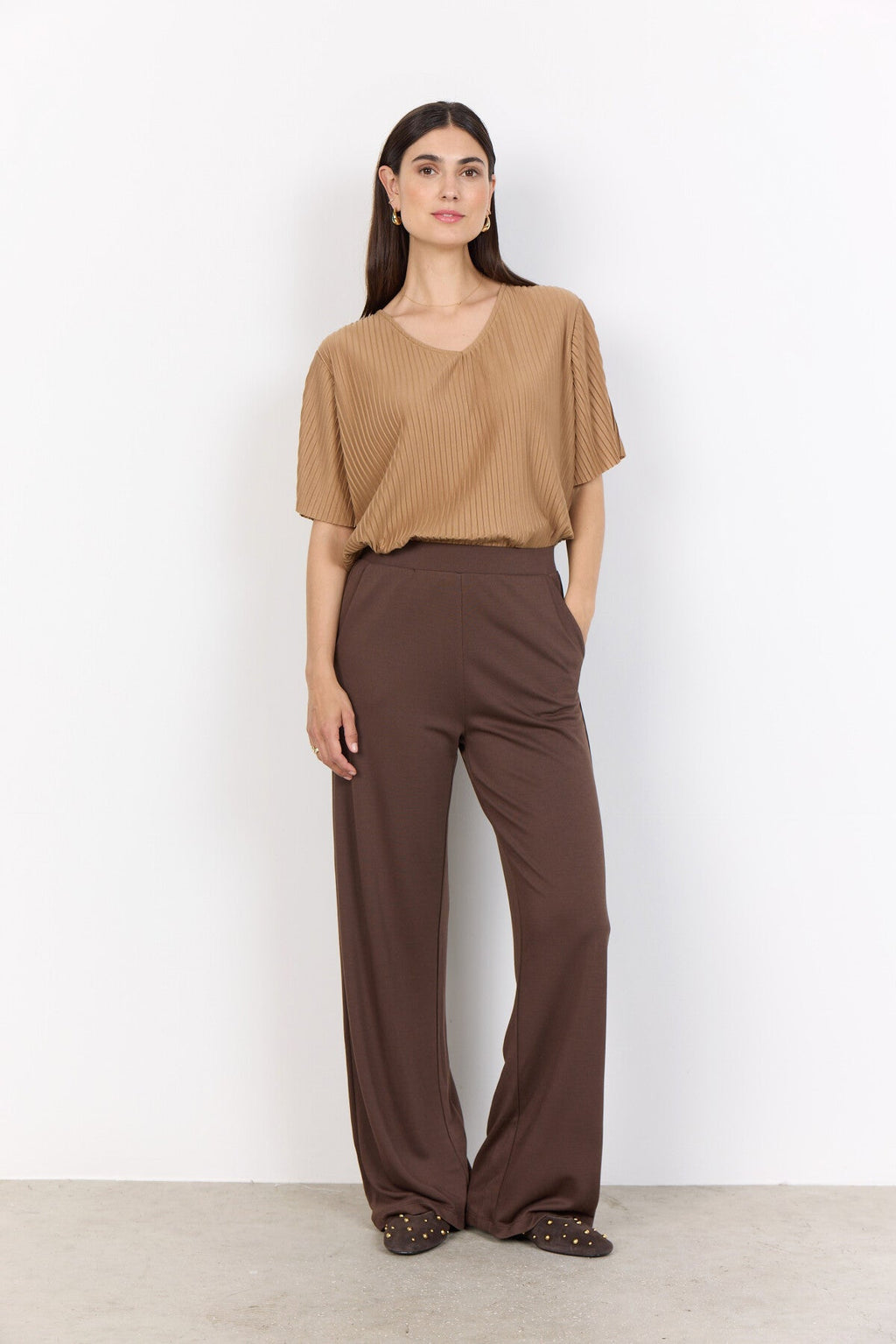 Brown, full length pants. Elastic waistband and front pockets. 