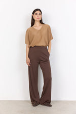 Load image into Gallery viewer, Brown, full length pants. Elastic waistband and front pockets. 
