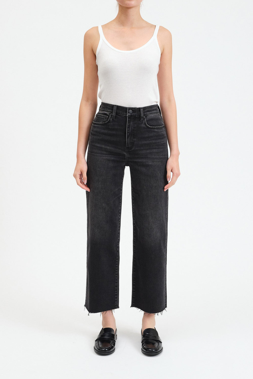 Black high waisted, wide jeans. Ankle length with raw hem. 