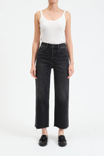 Load image into Gallery viewer, Black high waisted, wide jeans. Ankle length with raw hem. 
