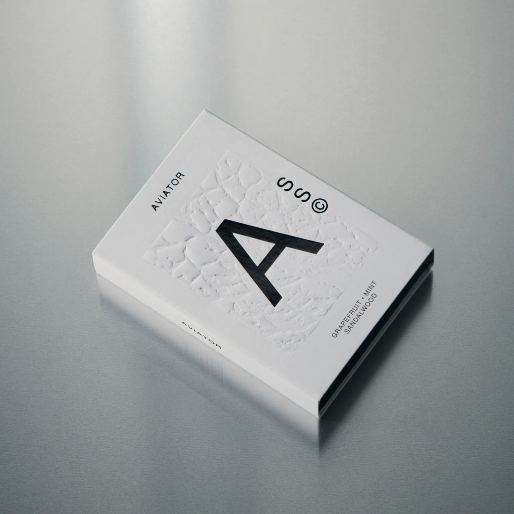 Solid Cologne. Top Notes: Grapefruit, Mint, Bergamot 
Heart Notes: Melon, Ginger, Jasmine 
Base Notes: Sandalwood, Amber, Cedar Wood