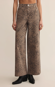 Leopard print high-rise jeans featuring a full-length wide leg and utility-inspired five-pocket styling.