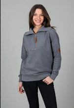Load image into Gallery viewer, Woman wearing a gray pullover with a zipper on a gray background
