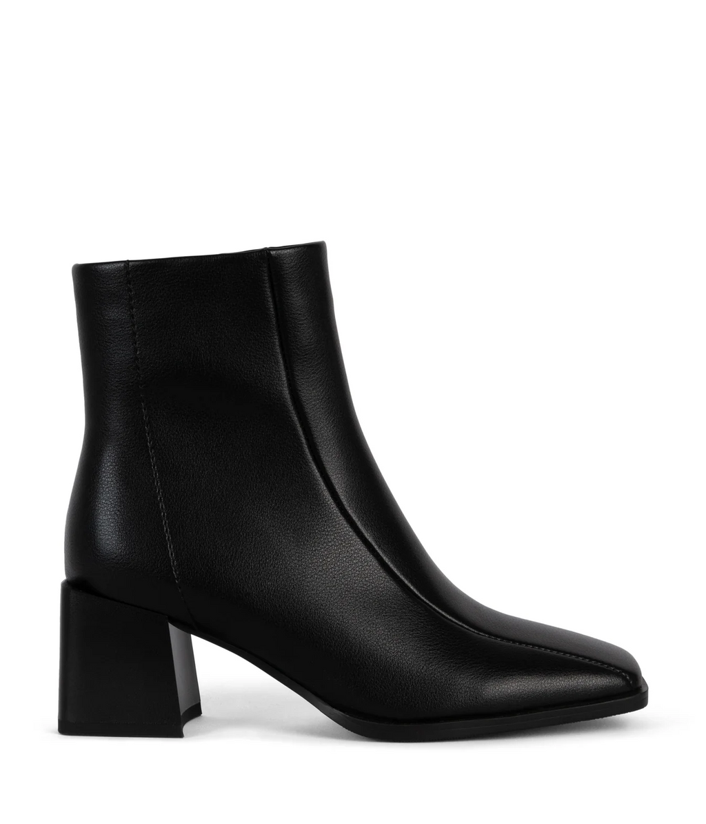 Black ankle boots with a block heel on a white background