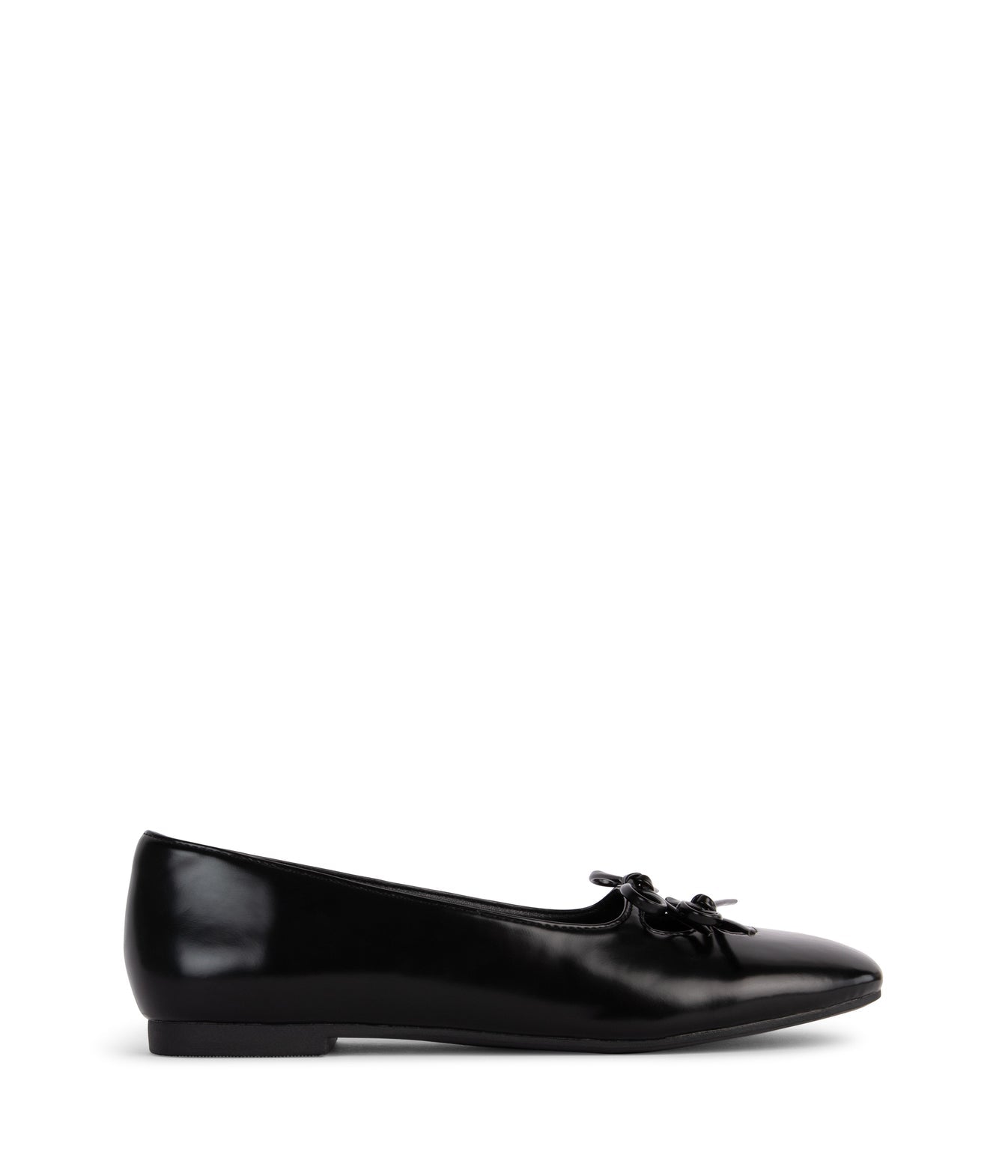 Black flat shoe with a bow on a white background