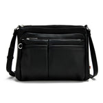 Load image into Gallery viewer, Black vegan leather crossbody bag on a white background
