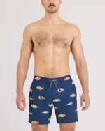 Load image into Gallery viewer, Men’s swim trunks with fish pattern on blue background
