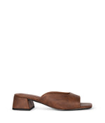 Load image into Gallery viewer, Brown vegan leather slide with square toe and block heel. 

