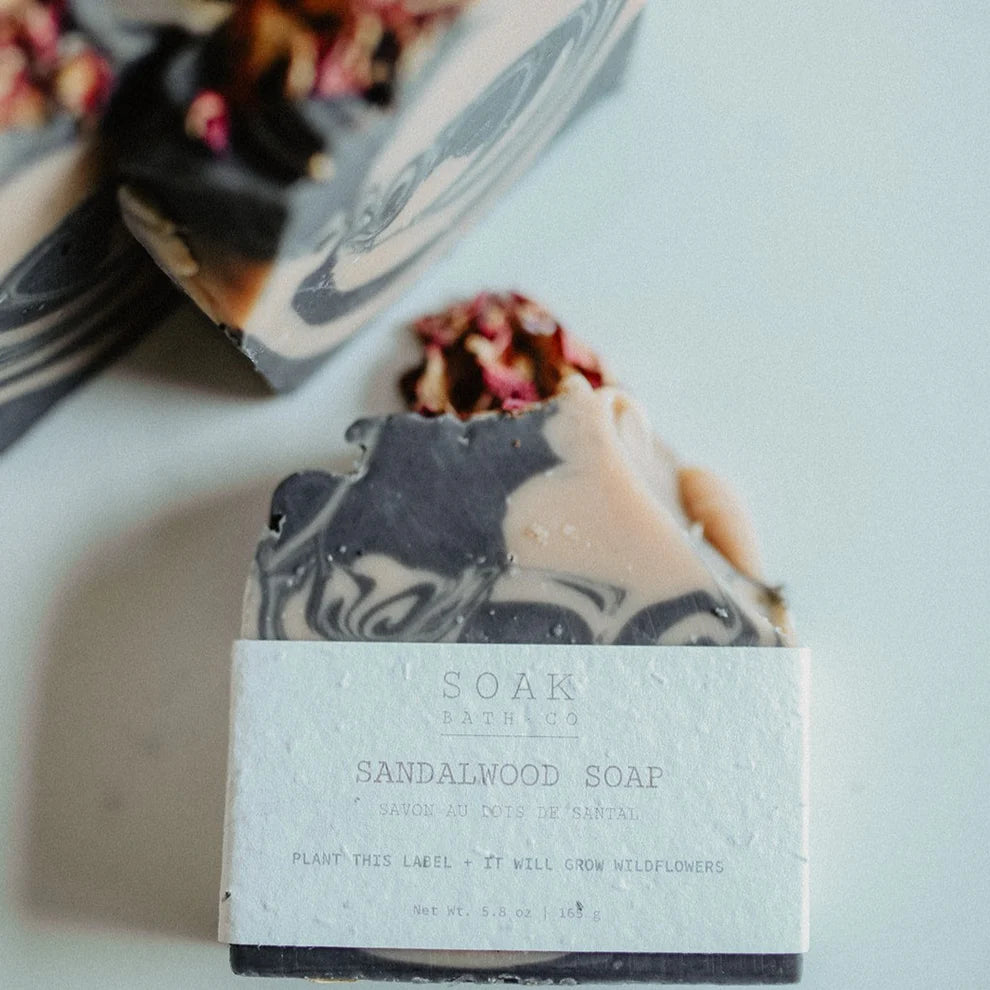 Marble-patterned soap bar with a label on a light background