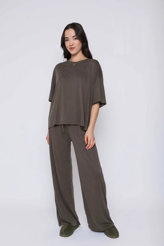 Olive green wide leg drawstring pants. 