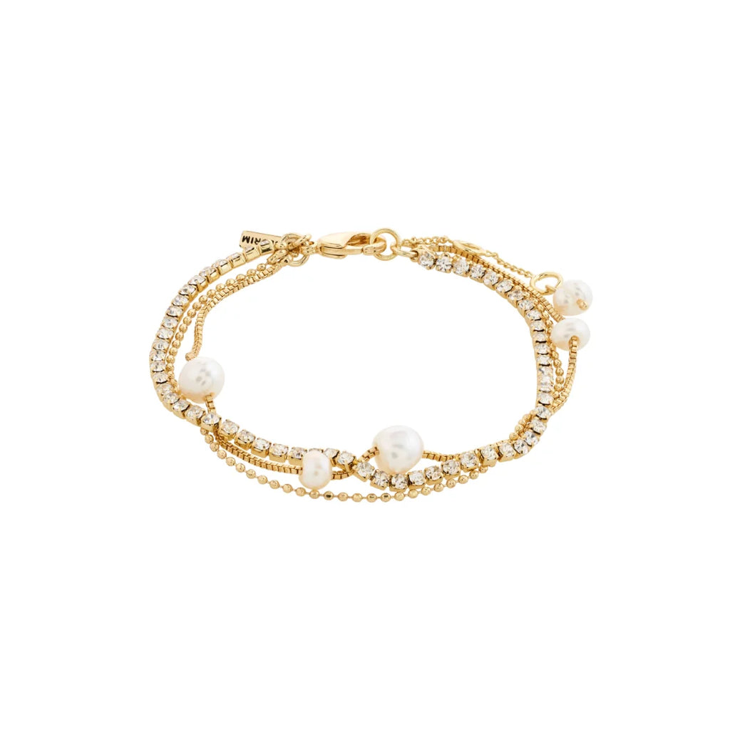 Gold bracelet with pearls and crystals on a white background