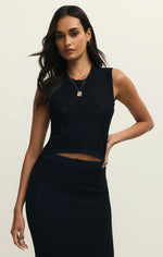 Load image into Gallery viewer, Woman wearing a black sleeveless top and skirt set on a plain background
