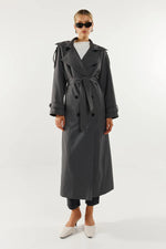 Load image into Gallery viewer, Person wearing a long gray trench coat on a white background
