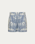 Load image into Gallery viewer, Blue and white patterned shorts on a light gray background

