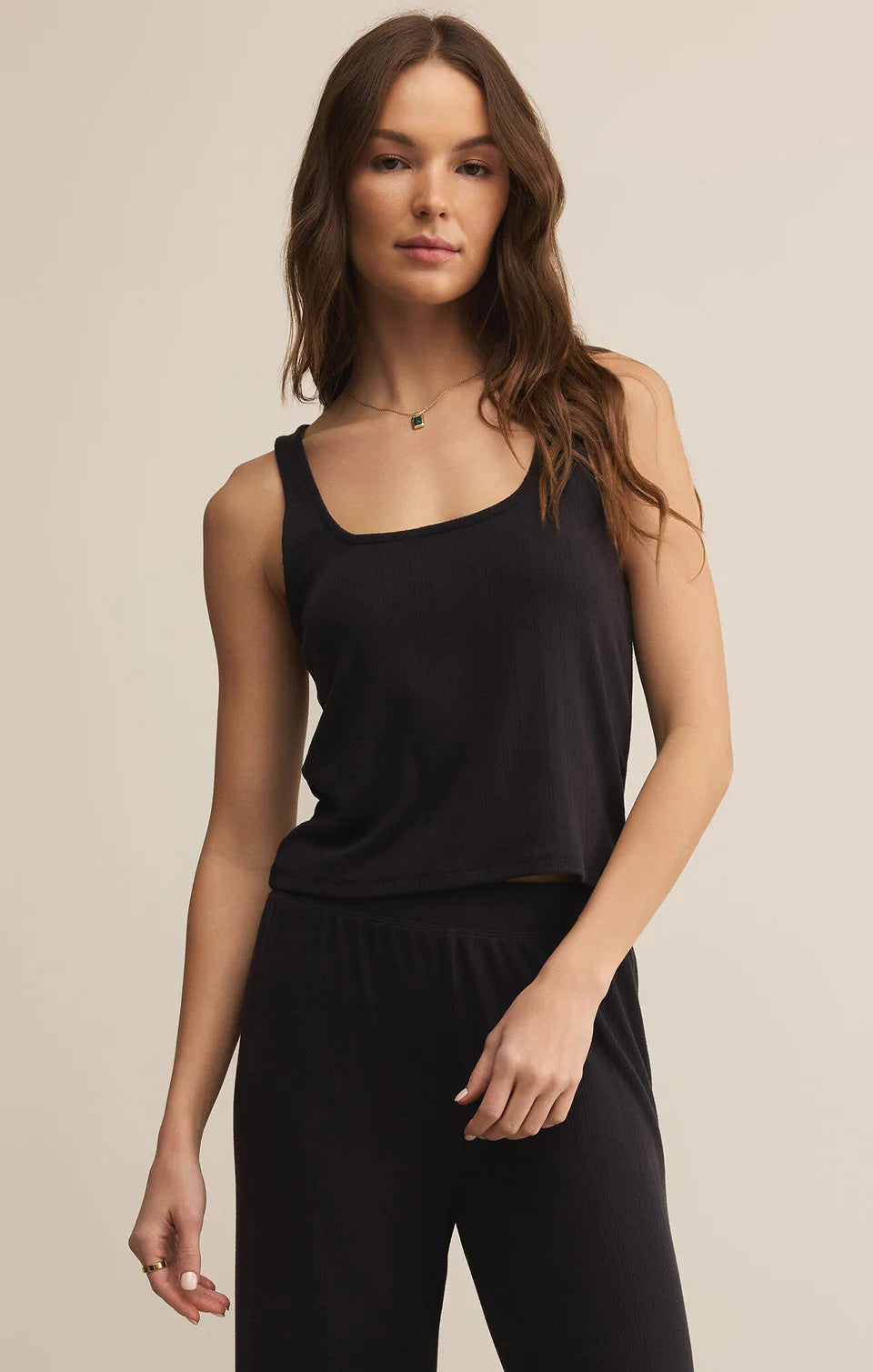 Woman wearing a black lounge tank