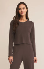 Load image into Gallery viewer, Woman wearing a brown ribbed long-sleeve top and pants on a beige background
