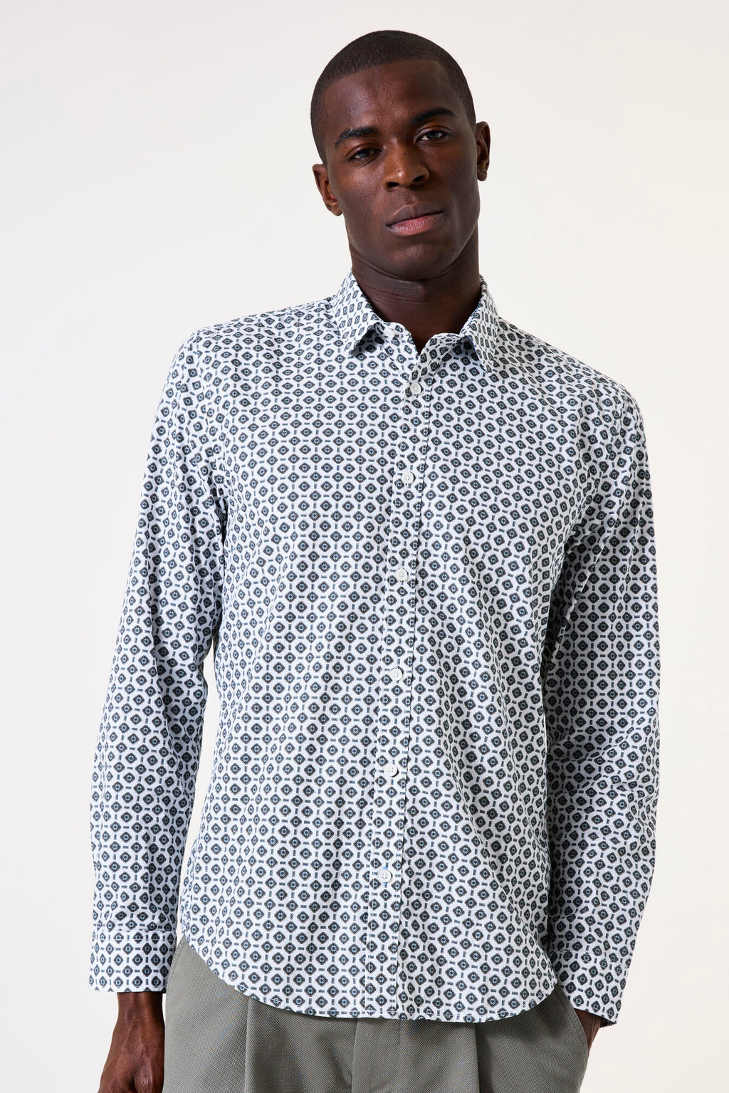 Blue and white patterned man's shirt.
