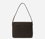 Load image into Gallery viewer, Truffle brown handbag with a strap on a light gray background
