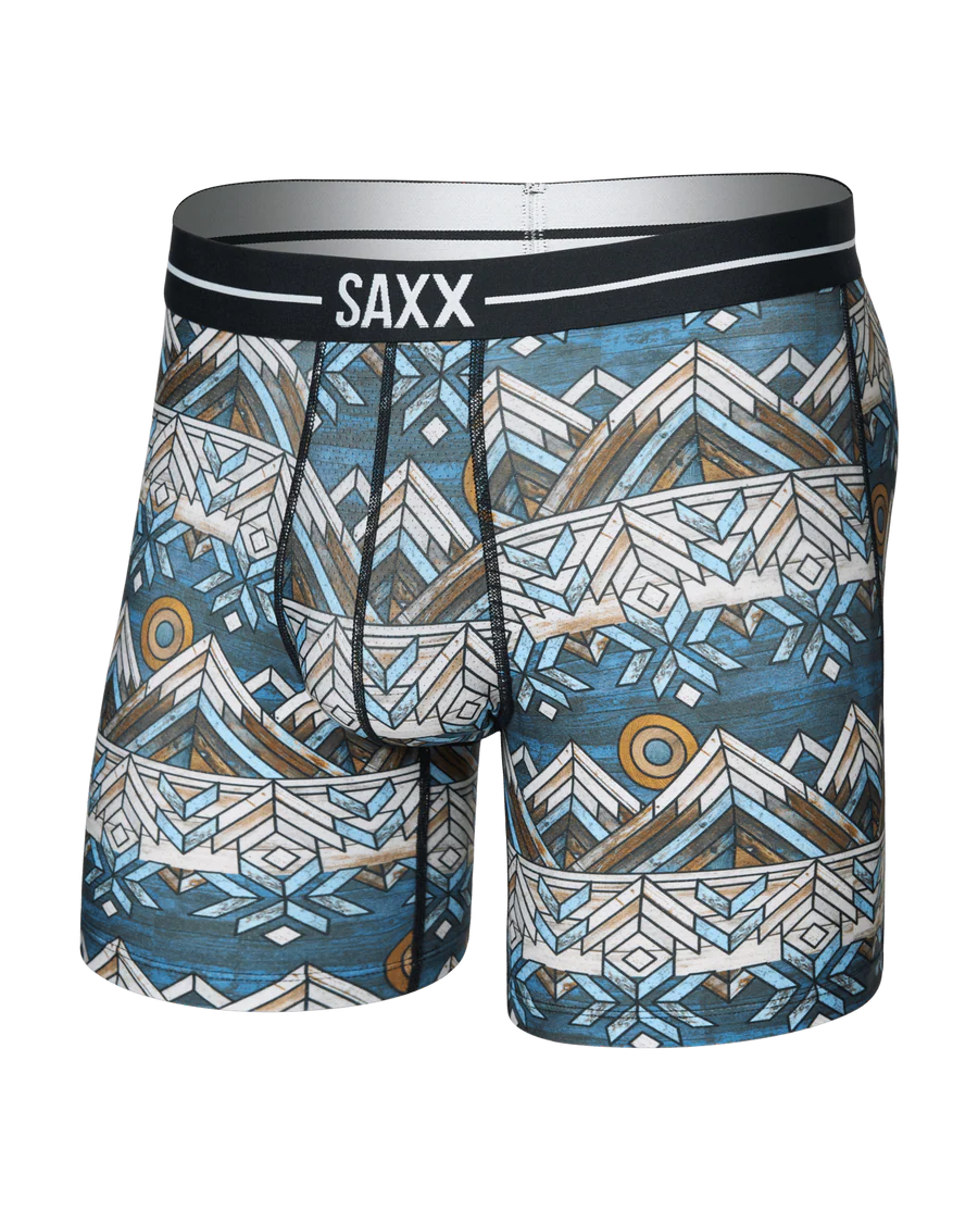 Geometric patterned boxer briefs with SAXX branding on a white background