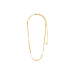 Load image into Gallery viewer, Gold necklace with mother of pearl beads on a white background.
