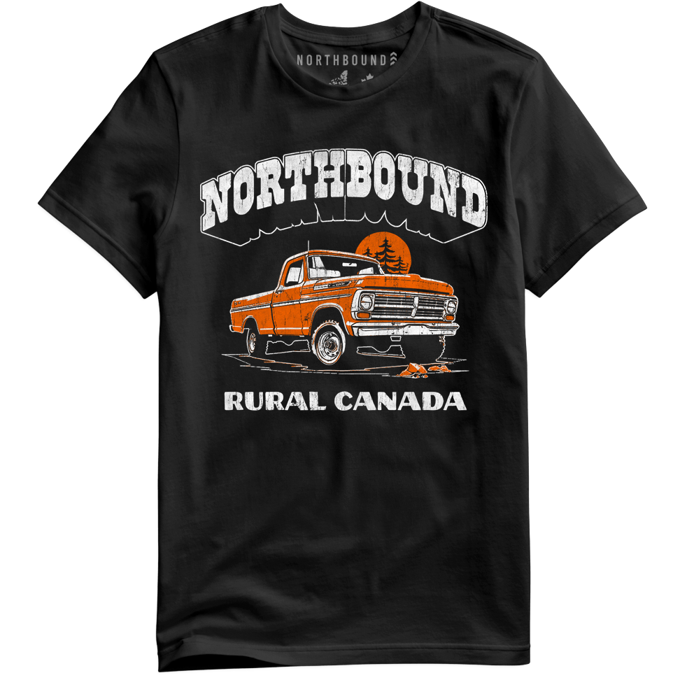 Black t-shirt with an orange truck graphic and 'Northbound Rural Canada' text on a white background