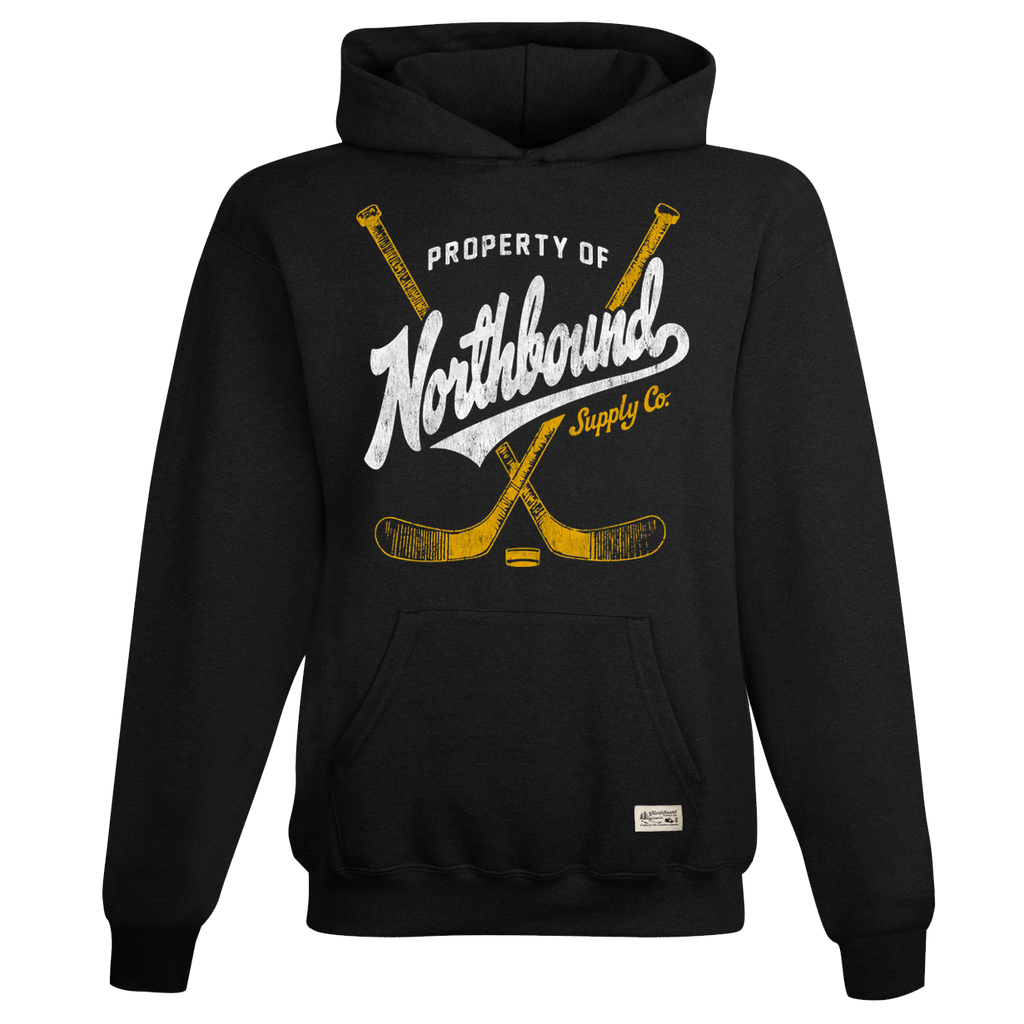 Black hoodie with 'Property of Northbound Supply Co.' text and hockey stick graphics on a white background